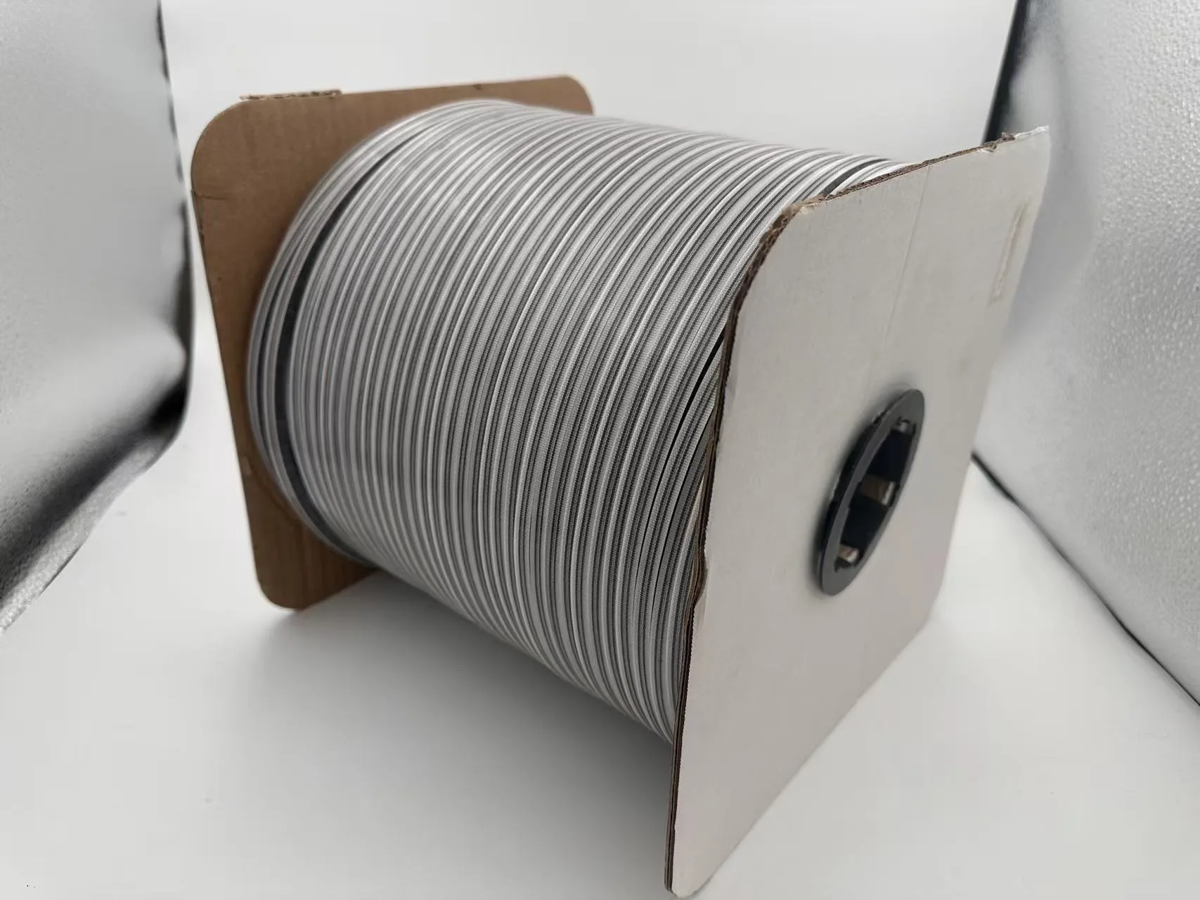 Custom wool pile weatherstrip roll on OEM spool